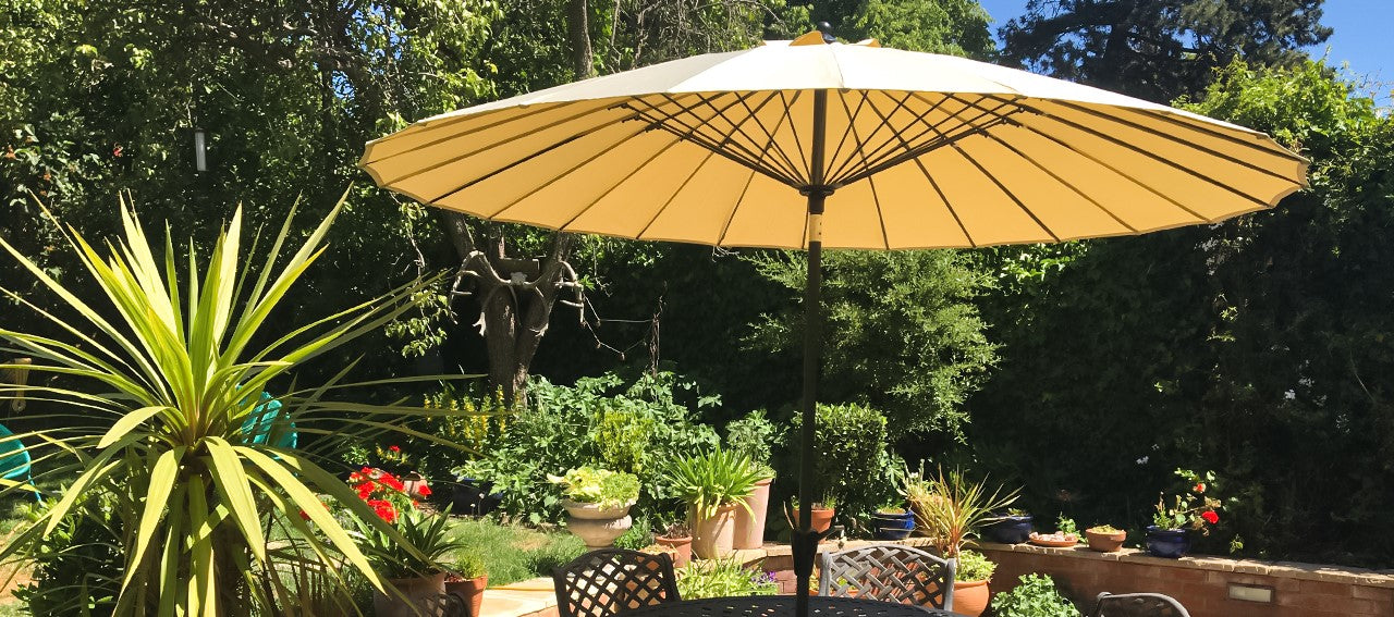 Hoe maak je je tuinparasol schoon?